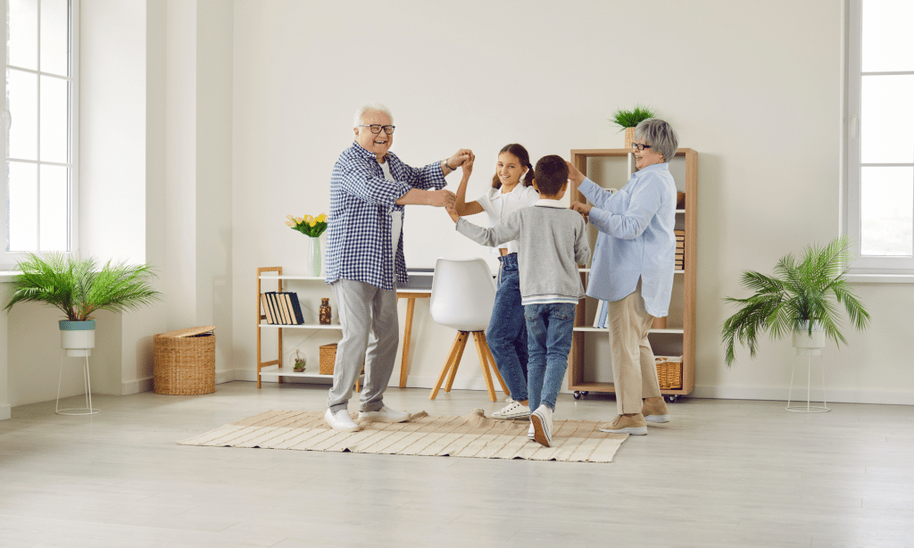 An aging couple dances with their family after adopting a minimalist lifestyle which creates more space in their home and increased happiness